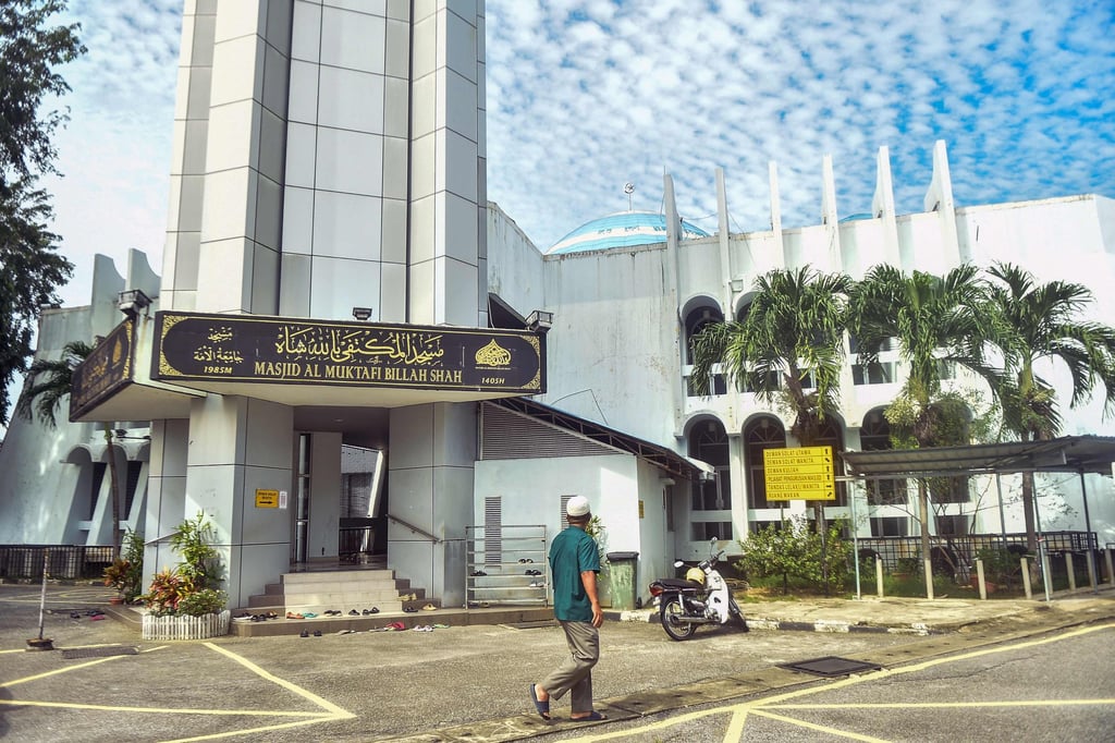 A man walks past a mosque in Kuala Terengganu, Malaysia’s Terengganu state, in December last year. Photo: AFP
