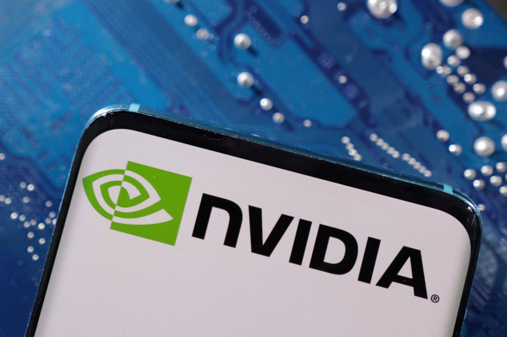 A smartphone with the Nvidia logo is placed on a computer motherboard in this illustration taken March 6, 2023. Photo: Reuters