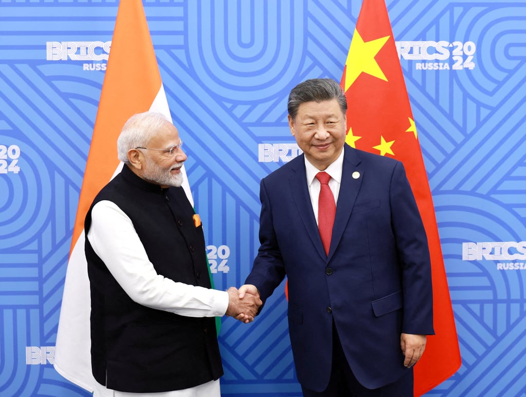 Chinese President Xi Jinping (right) and India Prime Minister Narendra Modi meet on the sidelines of the Brics summit last October in Kazan, Russia.