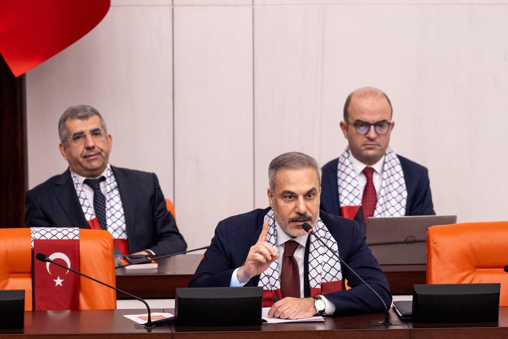 Turkish Foreign Minister Hakan Fidan speaks during an extraordinary parliamentary session in Ankara on Friday. Photo: Turkish Foreign Ministry via Reuters