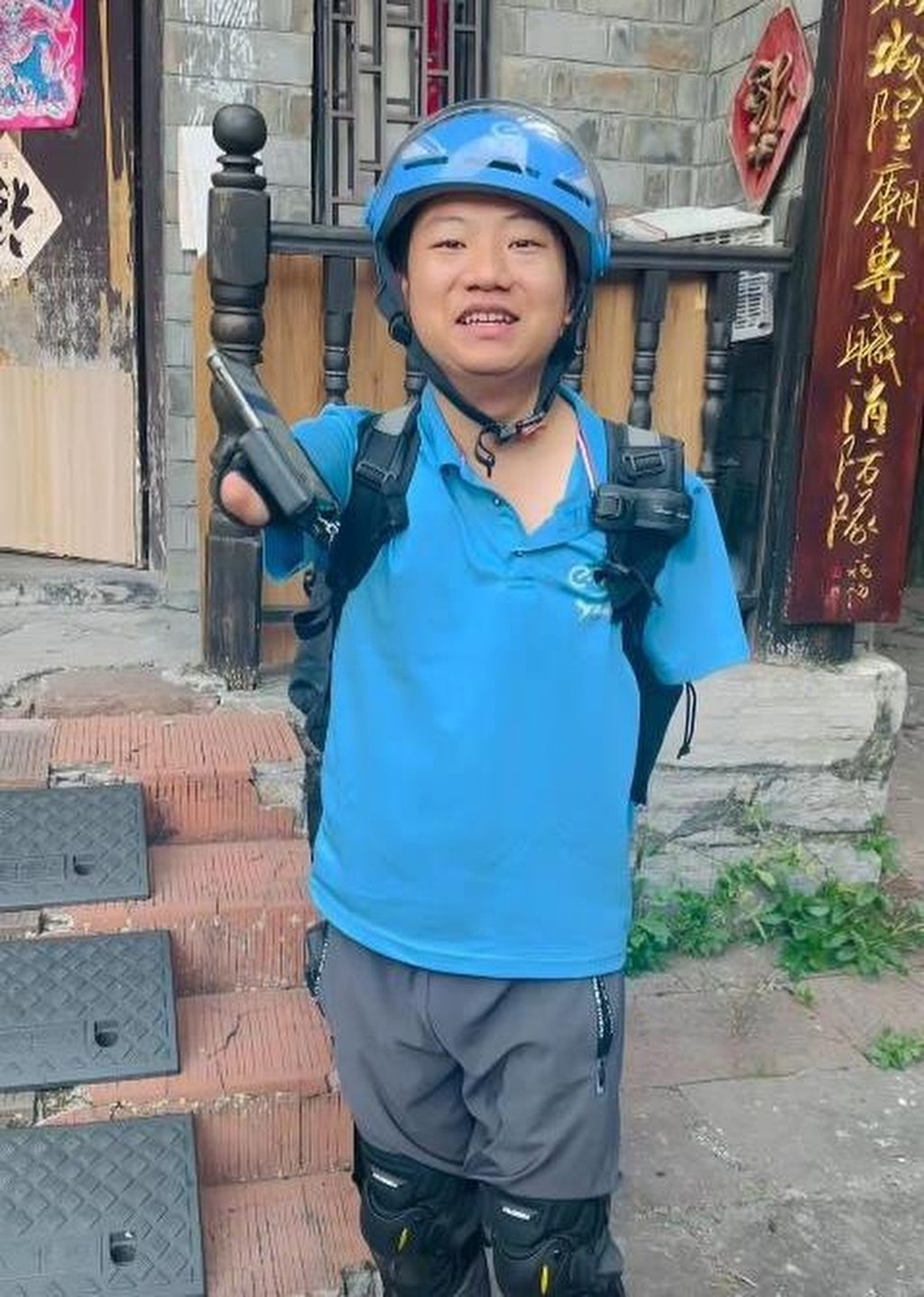 Li Xiangyang, who lost both his arms in a childhood accident, says there is no point in dwelling on the past. Photo: Handout