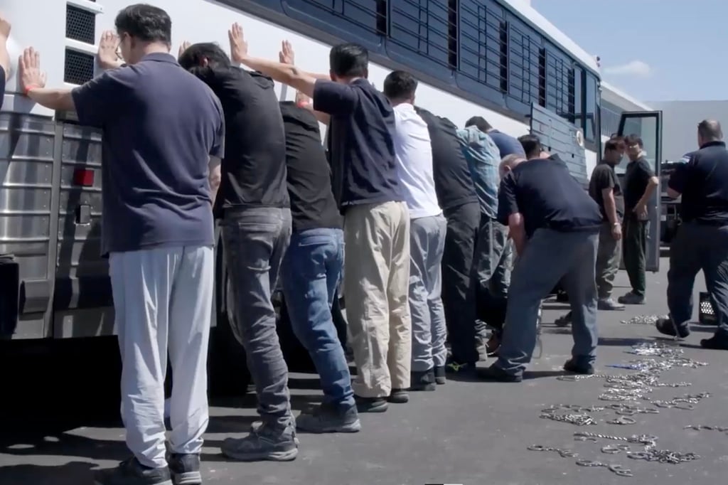 A still frame from a video shows an immigration raid at the Hyundai-LG vehicle assembly plant in Ellabell, Georgia, on Thursday last week. Immigration officials arrested 475 workers in the raid, most of them South Korean citizens. Photo: EPA/Handout