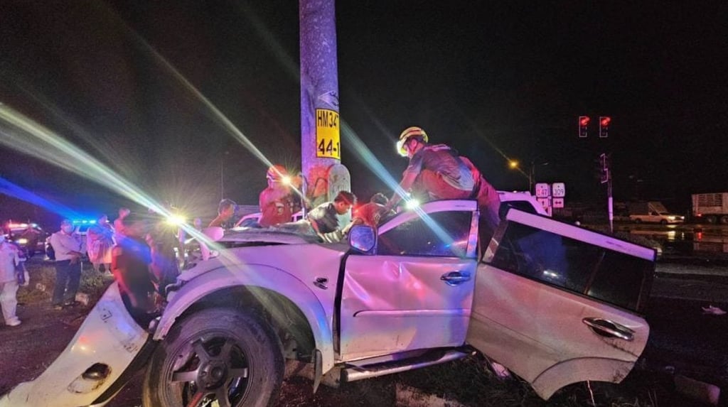 The driver’s white SUV was almost cut in half by the sheer impact of the crash. Photo: Handout