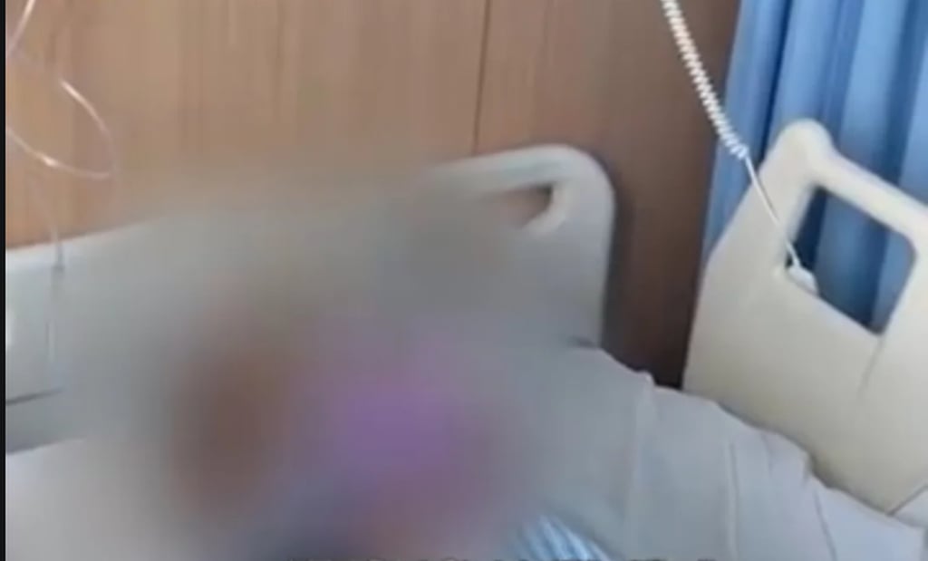 Li, in his hospital bed, was diagnosed with stomach cancer in 2022 and had to stop working. Photo: QQ.com