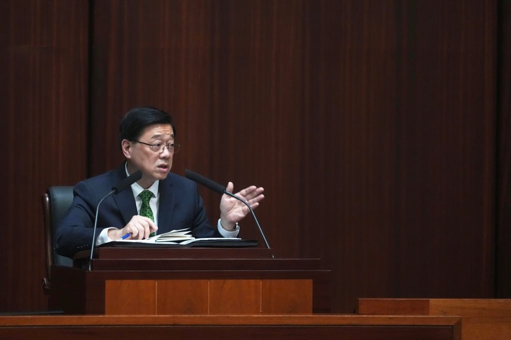 Chief Executive John Lee attends a question and answer session in the legislature. Photo: Karma Lo.