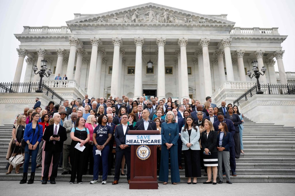 US House Democratic Leader Hakeem Jeffries (centre) is joined by fellow House Democrats as he speaks at a press conference outside the US Capitol on Tuesday. Photo: AFP