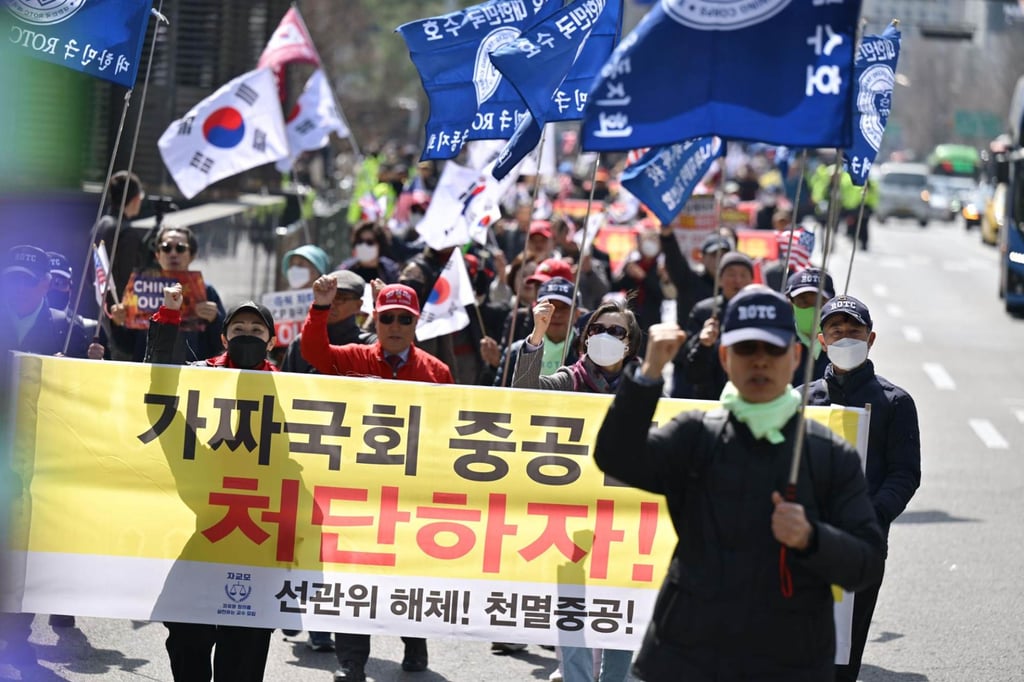 Participants in an anti-China rally march from the Chinese embassy in Seoul to the Constitutional Court in August. Photo: Korea Times