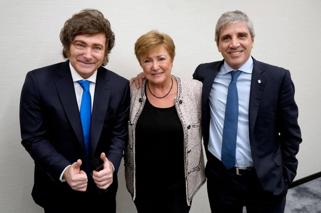 Argentina’s President Javier Milei (left) and Economy Minister Luis Caputo pose for a picture with IMF Managing Director Kristalina Georgieva in New York in September. Photo: Argentina’s Presidency Press Office via AFP
