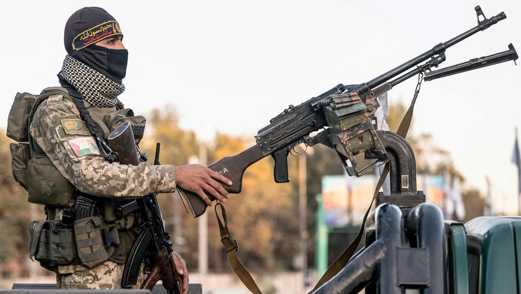 A Taliban security personnel keeps guard on top of a military vehicle along a Kabul street on Monday. Photo: AFP