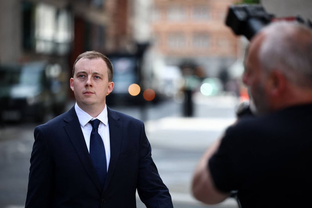 Christopher Berry leaves court in London in May 2024. Berry, who previously worked at the UK parliament as a researcher, was accused of breaking the Official Secrets Act 1911. Photo: AFP