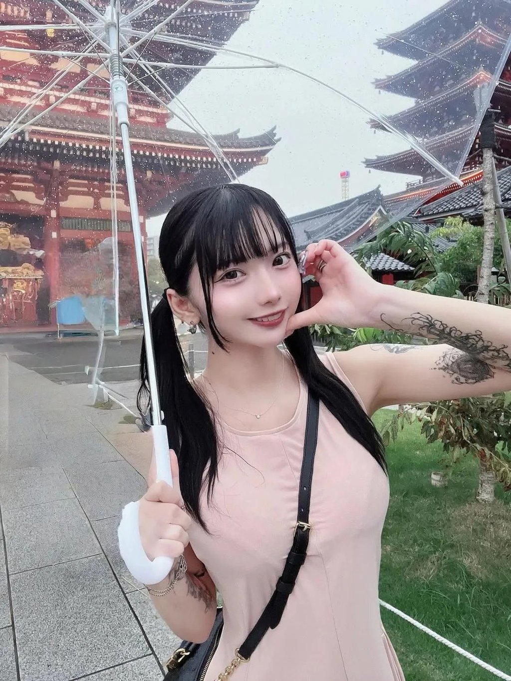 Underground idol Touka Toozuki poses for her fans under an umbrella. Photo: Handout