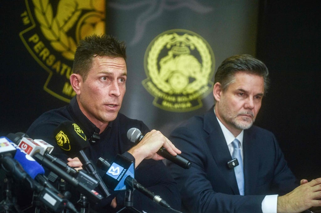 Chief Executive Officer of the Malaysian national football team Rob Friend (left) speaks at a press conference on Friday. Photo: AFP