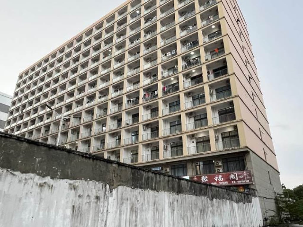 A high-walled building in Sihanoukville, which is believed to be part of a criminal scam compound. Photo: Hankook Ilbo