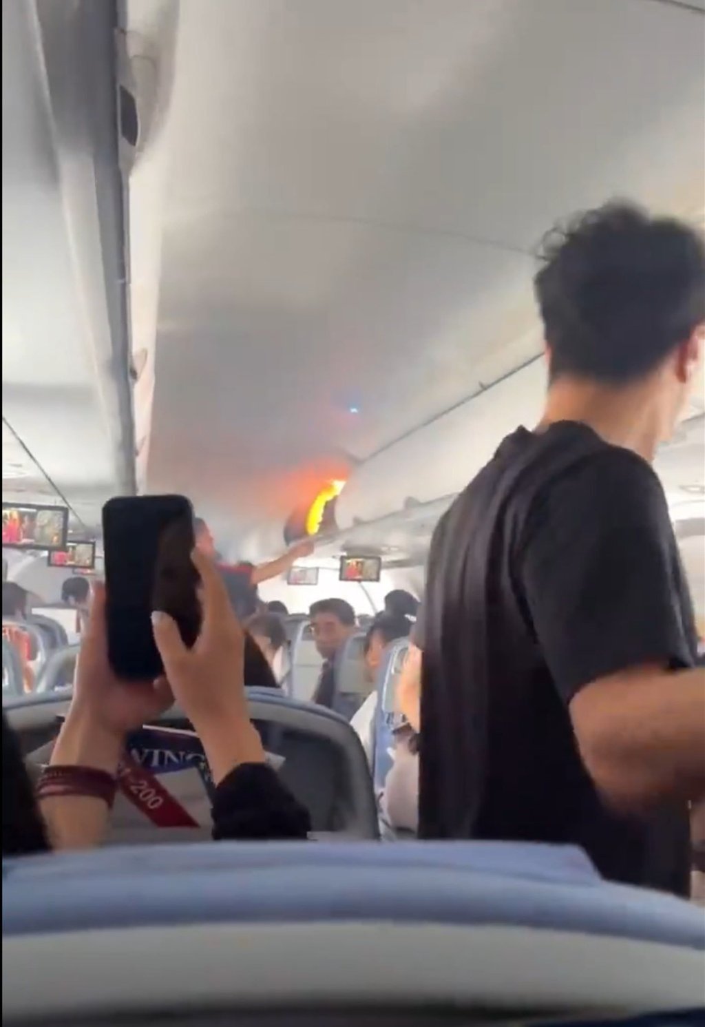 Passengers aboard the Air China flight on Saturday were heard shouting “hurry up” in Korean. Photo: Handout