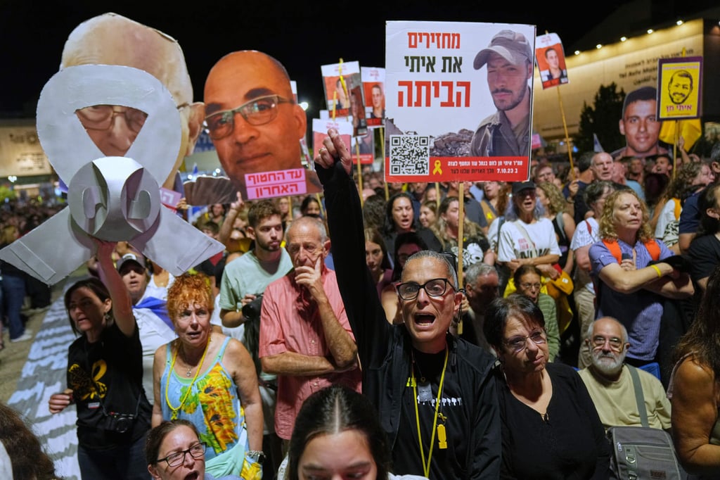 People take part in a rally in Tel Aviv, Israeli, on Saturday demanding the return of the bodies of hostages kidnapped by Hamas. Photo: AP