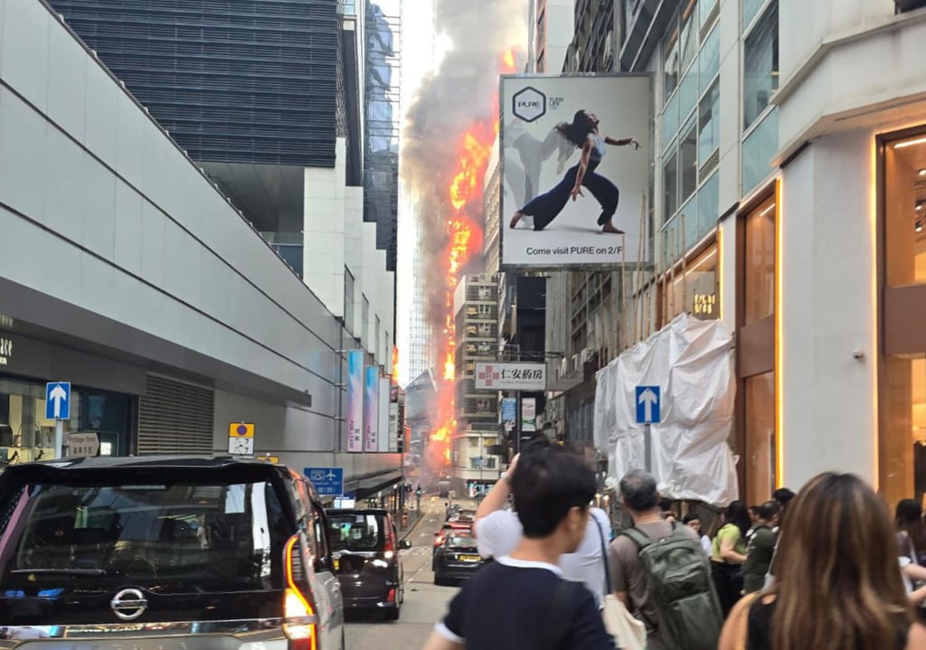 Flames erupt from the Chinachem Tower in Central. Photo: Handout