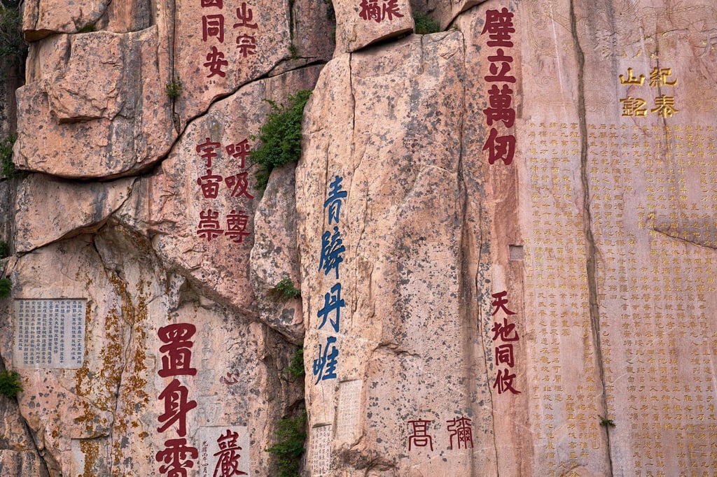 Inscriptions on a rock face at Taishan Mountain, which is a protected site in China. Photo: Shutterstock
