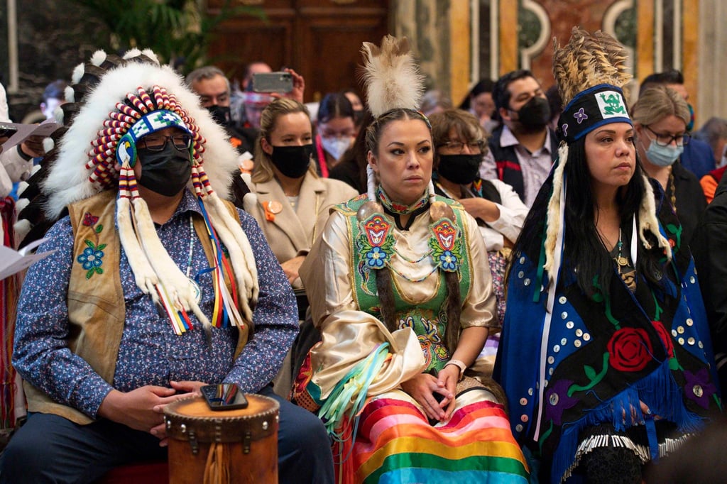 Members of a delegation of the indigenous peoples of Canada attending an audience with Pope Francis in Vatican City on April 1, 2022. Pope Francis apologised to representatives of Canadian indigenous peoples for the suffering they endured in Canada’s Catholic residential schools. Photo: EPA-EFE/Vatican Media