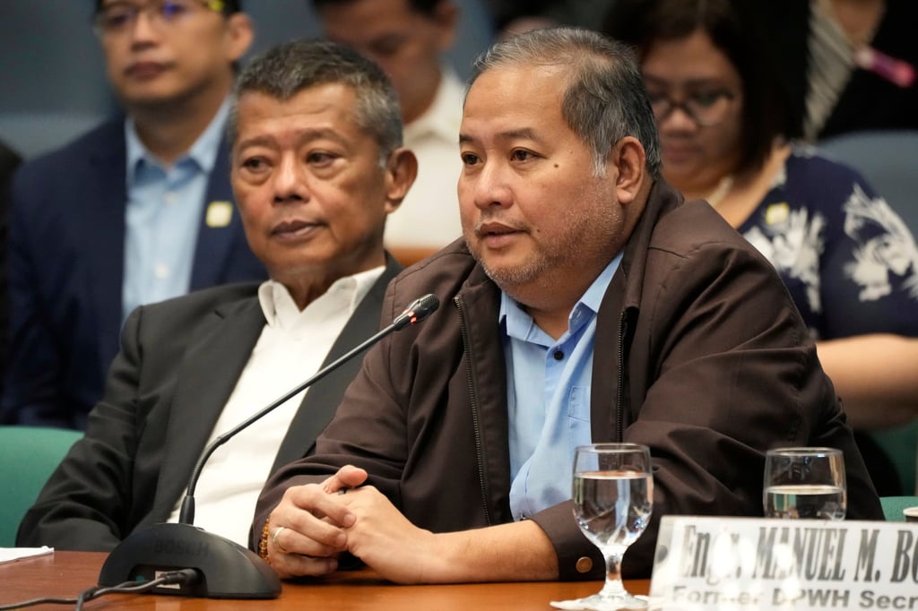 Henry Alcantara (right) during investigations on flood-control projects at the Senate Blue Ribbon committee in Pasay city in September. Photo: AP