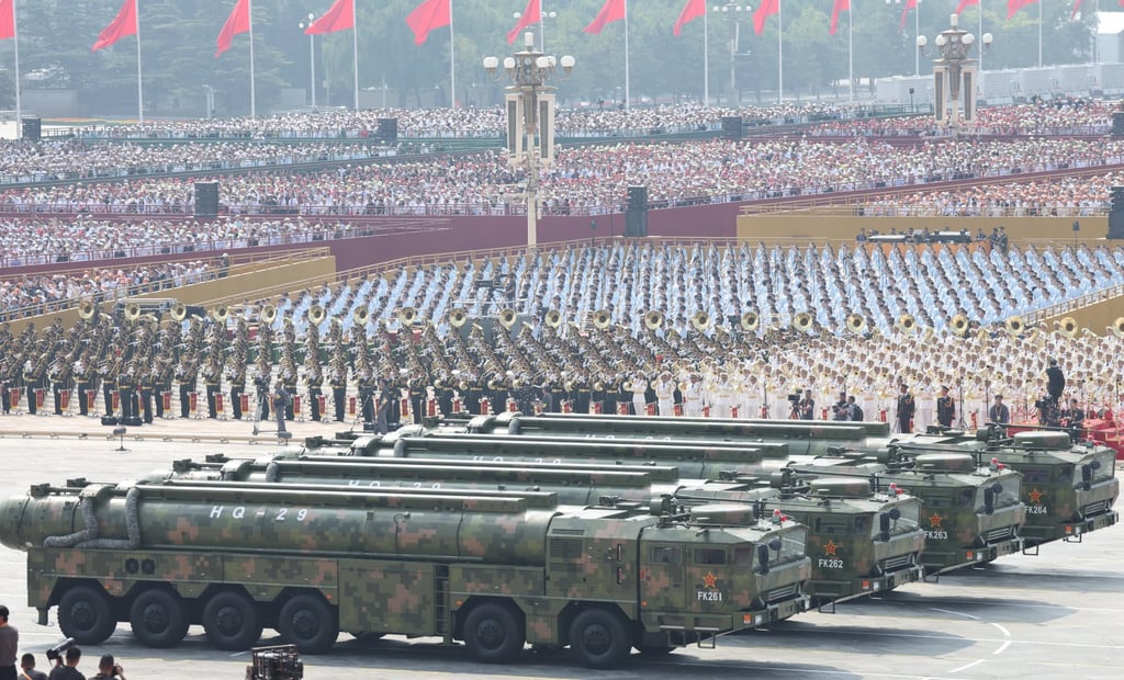 Military vehicles transport the PLA’s new HQ-29 anti-aircraft missiles during China’s Victory Day parade, in Beijing on September 3. Photo: China News Service via Getty Images