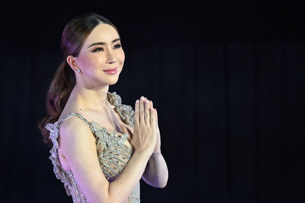 Jakkaphong Jakrajutatip arrives on stage during the Miss Universe Extravaganza in 2022. Photo: AFP