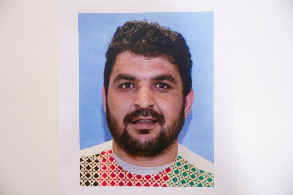 A picture of Rahmanullah Lakanwal, an Afghan national who is the suspect in the shooting of two National Guard members, is displayed at a press conference in Washington on Thursday. Photo: Reuters