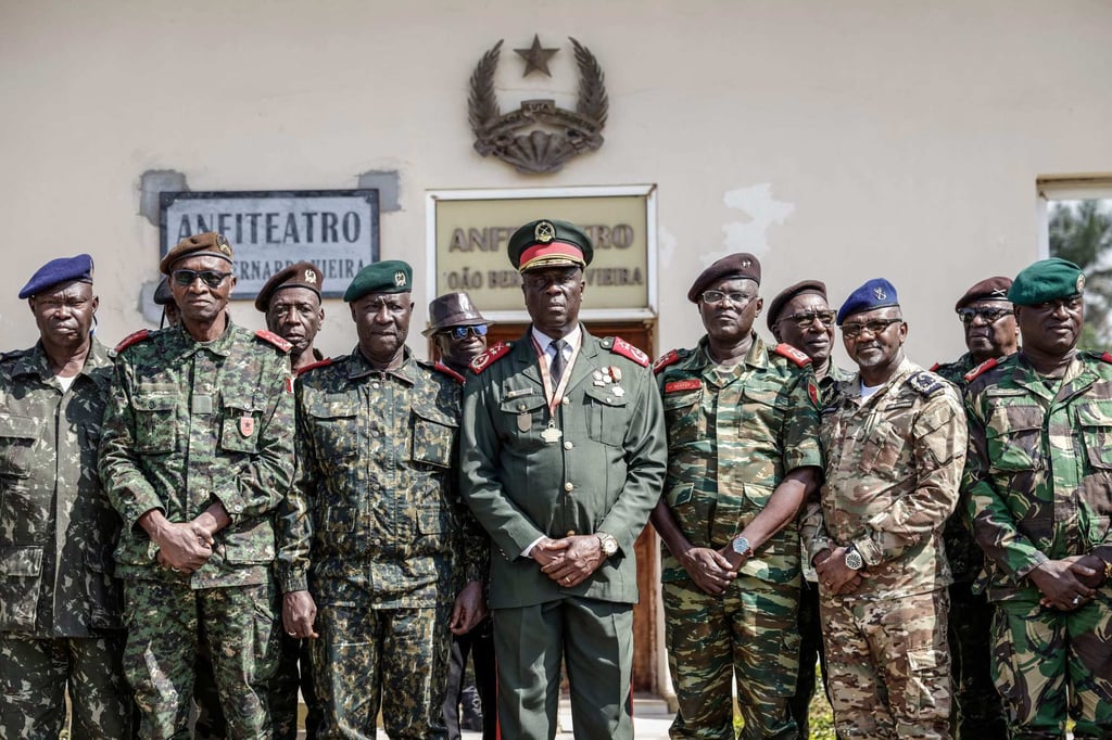 General Horta N’Tam with other military leaders after being sworn in as the transition leader. Photo: AFP
