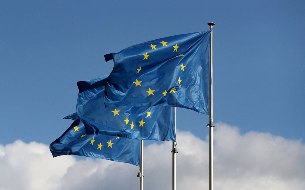 EU flags flutter outside the European Commission headquarters in Brussels. The bloc’s commission will examine whether VW Anhui can replace its countervailing duties with a managed price system. Photo: Reuters