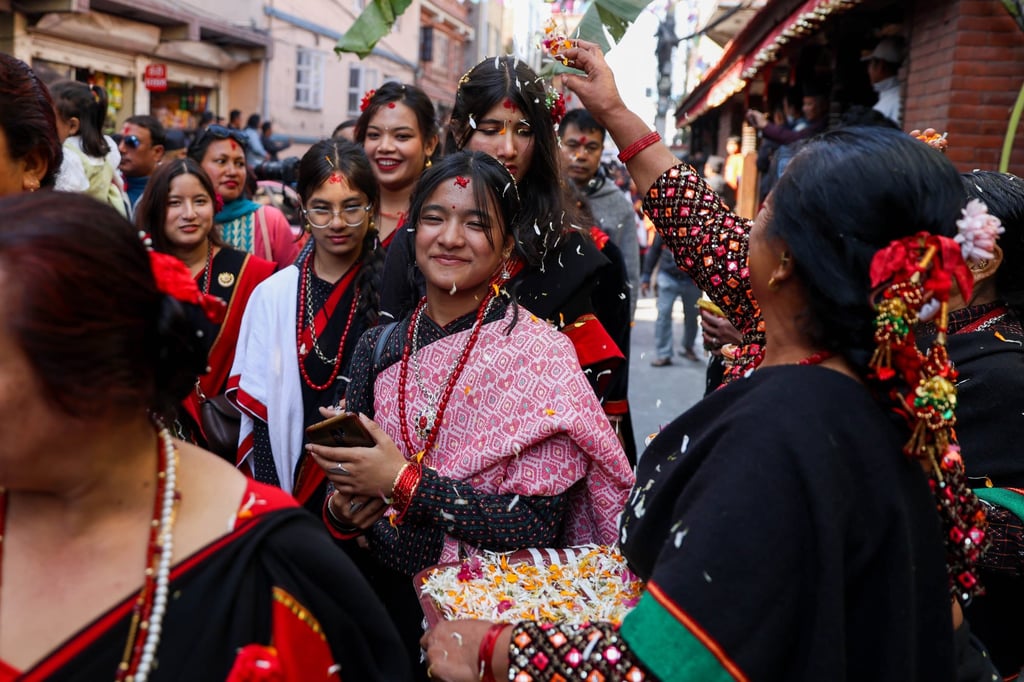 Nepali women and girls take part in a traditional celebration in Kathmandu, Nepal, on Thursday. Photo: Xinhua