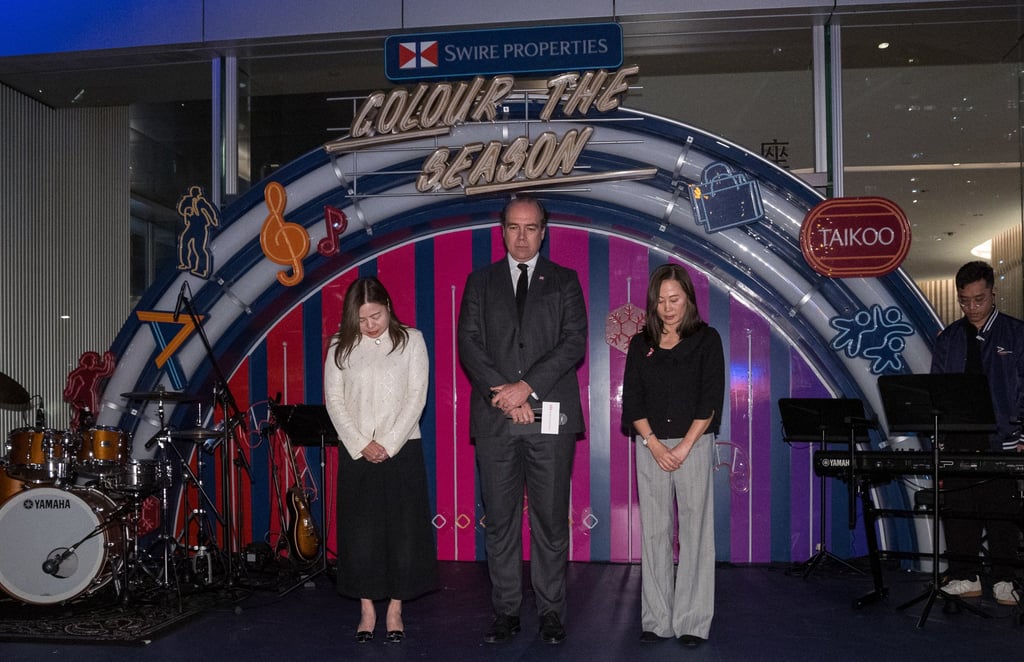 (From left) Secretary for Culture, Sports and Tourism Rosanna Law, Swire Properties chief executive Tim Blackburn and Post editor-in-chief Tammy Tam at the tree lighting ceremony. Photo: Dickson Lee