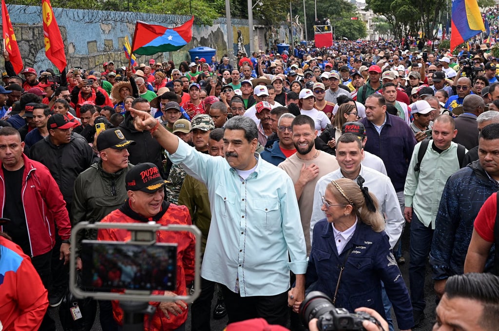 Venezuela’s President Nicolas Maduro joins his supporters during a march in Caracas on Wednesday. Photo: Reuters