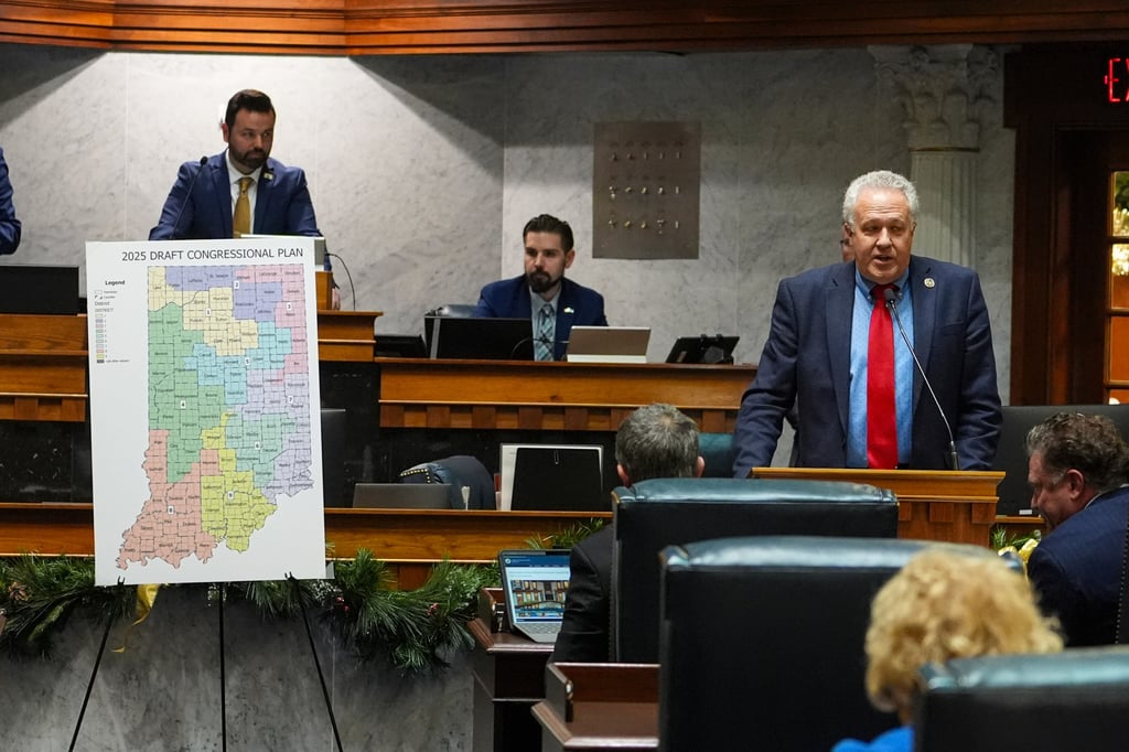 Republican State Senator Mike Gaskill (right), sponsor of the redistricting legislation, presents the bill at the Statehouse in Indianapolis on Thursday. Photo: AP