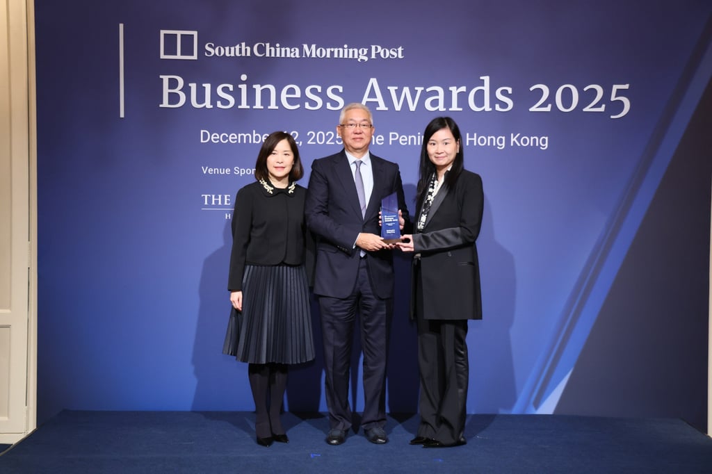 Randy Lai, the CEO of McDonald’s Hong Kong (left) and chairman Zhang Yicheng (centre) received the Company of the Year honour at the 2025 SCMP Live Business Awards from Catherine So, CEO of SCMP, on Friday. Photo: SCMP