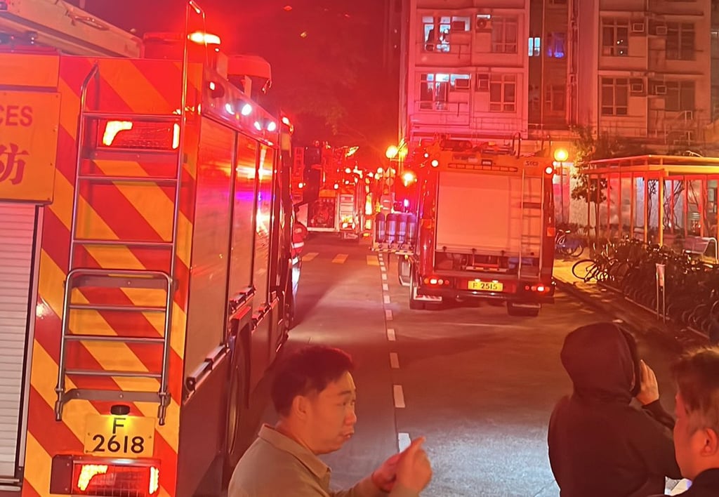 Firefighters at the scene of the fire in Tin Chak Estate, early on Saturday morning. Photo: Handout