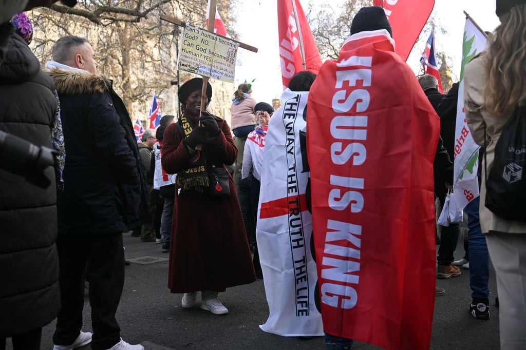 Supporters of British far-right activist Tommy Robinson gather in central London on Saturday. Photo: AFP