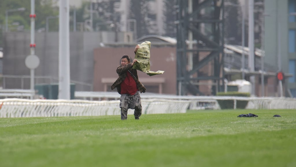A man ran onto the track during the Hong Kong Cup. Photo: Kenneth Chan