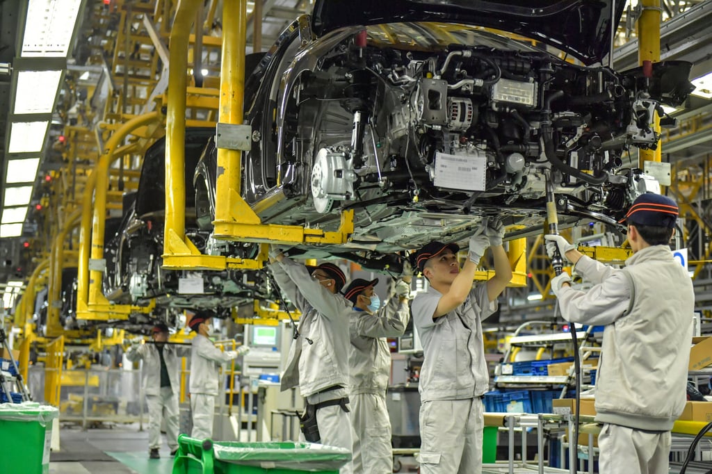 Employees on the assembly line of FAW-Volkswagen in the Sichuan provincial capital of Chengdu on December 9, 2025. Photo: VCG/VCG via Getty Images