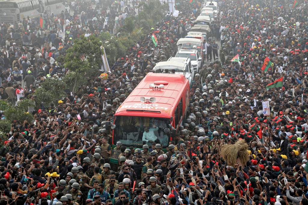 Bangladesh Nationalist Party (BNP) acting chairman Tarique Rahman waves from a coach in Dhaka after his arrival from London on Thursday. Photo: Reuters