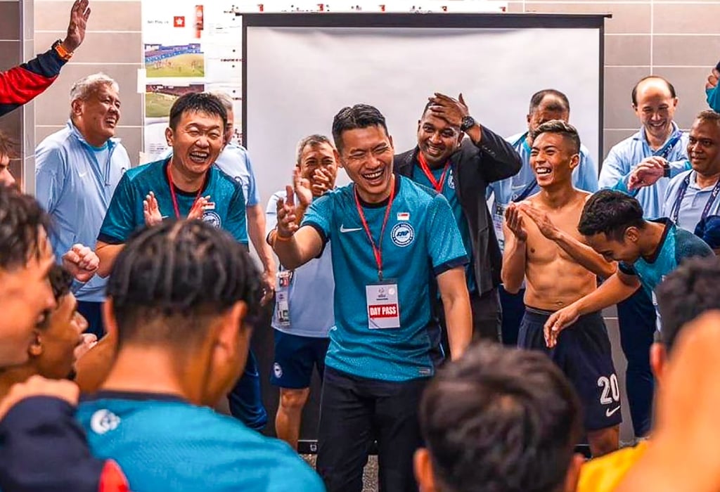 Acting sports minister David Neo (centre) addressing Singapore’s football players during their Asian Cup qualifier against Hong Kong in November. Singapore won 2-1. Photo: Handout