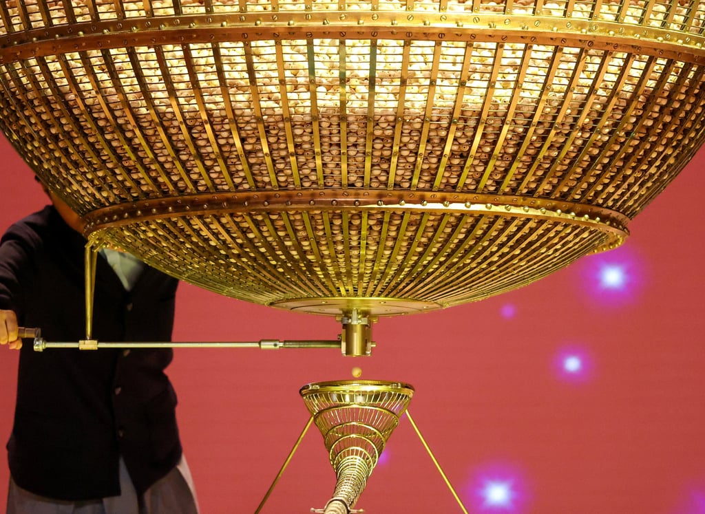 A ball is released from the drum during the El Gordo Christmas draw in Madrid on Monday. Photo: Reuters