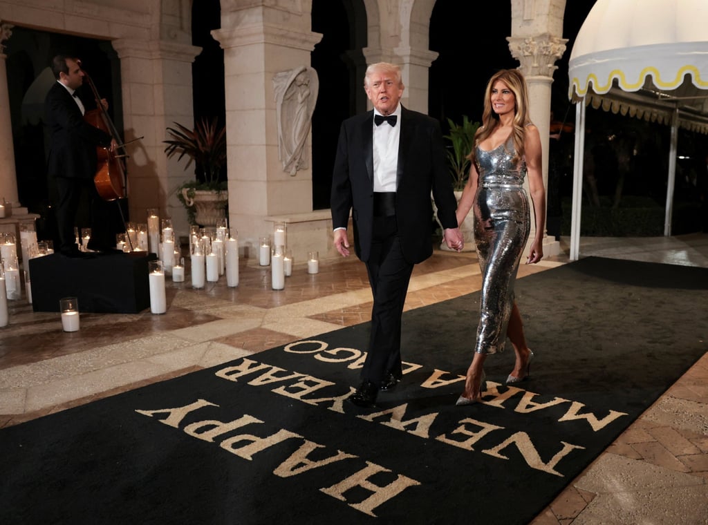 US President Donald Trump and first lady Melania Trump arrive to attend a New Year’s Eve party at Mar-a-Lago. Photo: Reuters