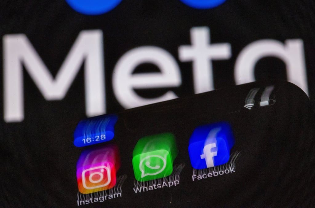 A smartphone displays icons of Meta’s social media platforms. Countries including Australia have moved to tighten online safety rules, as governments seek to hold tech companies more accountable for harmful content. Photo: DPA