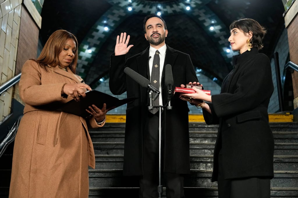 New York Attorney General Letitia James administers the oath of office to Zohran Mamdani next to his wife Rama Duwaji. Photo: AP