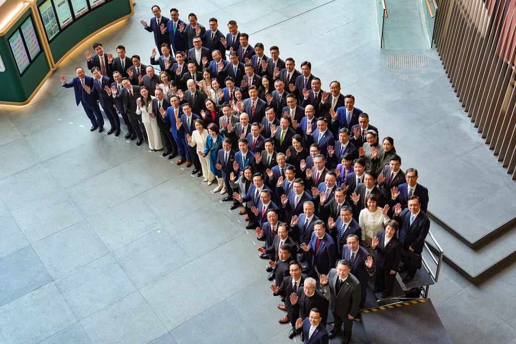Lawmakers pose for a group picture after the Legco oath-taking ceremony. Photo: Elson Li