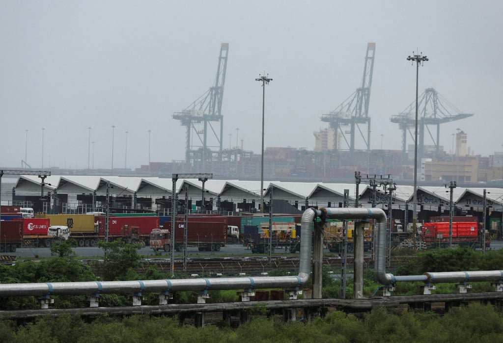 Trucks with shipping containers are parked at Jawaharlal Nehru Port in August. India’s exports in the April to November period rose 5.43 per cent to US$562.13 billion. Photo: Reuters