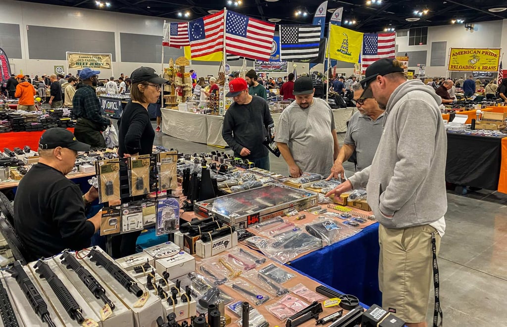 Vendors sell firearms and accessories at a gun event in Ontario, California, in 2023. Photo: AFP