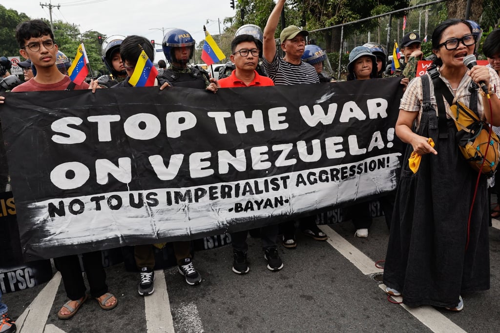 Protesters hold a banner outside the US Embassy in Manila on Monday during a rally opposing Washington’s military action in Venezuela following the seizure of President Nicolas Maduro. Photo: EPA-EFE