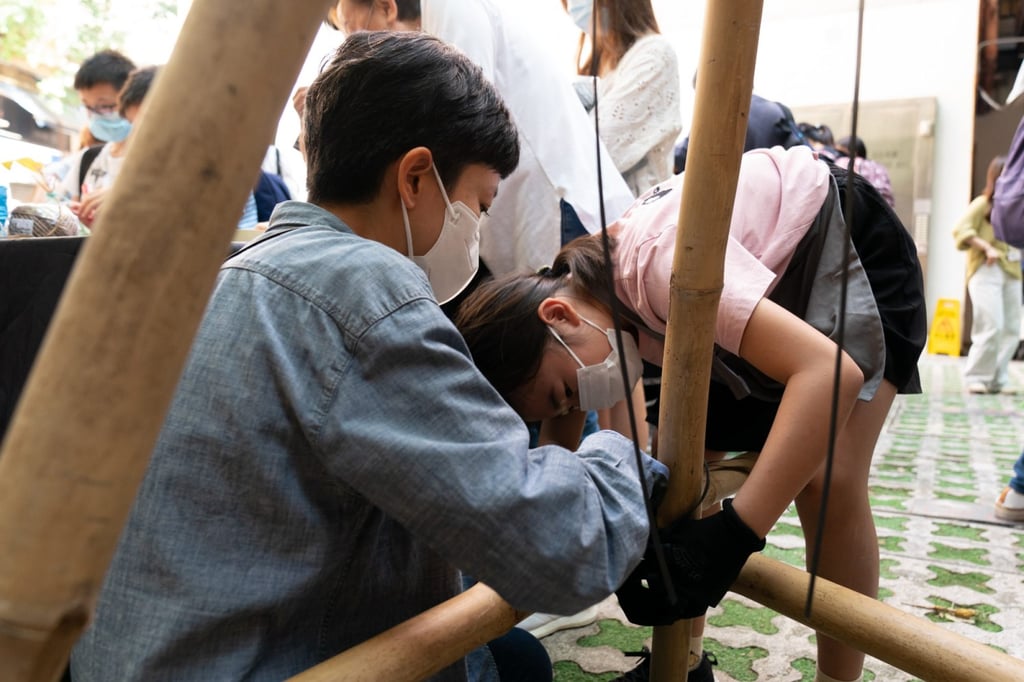 Children at the outdoor “school” learn how to start campfires, cook outdoors and use bamboo. Photo: Education for Good
