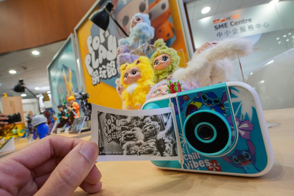 SMD Technologies showcases its instant cameras. Photo: Eugene Lee