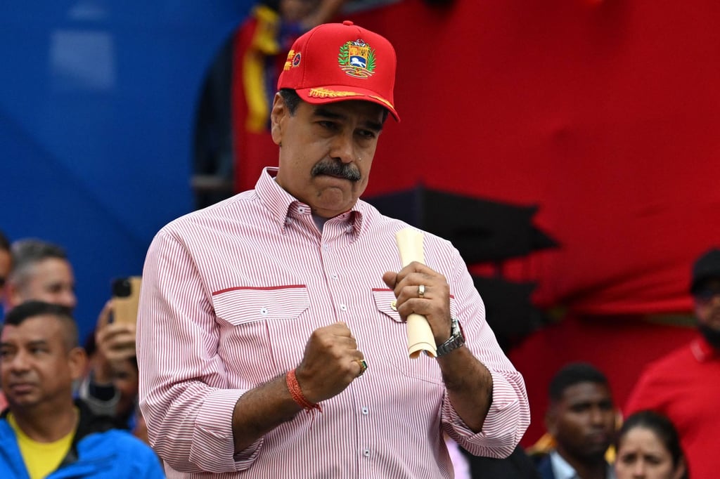 Venezuela’s President Nicolas Maduro dances during a rally in Caracas in December. Photo: AFP